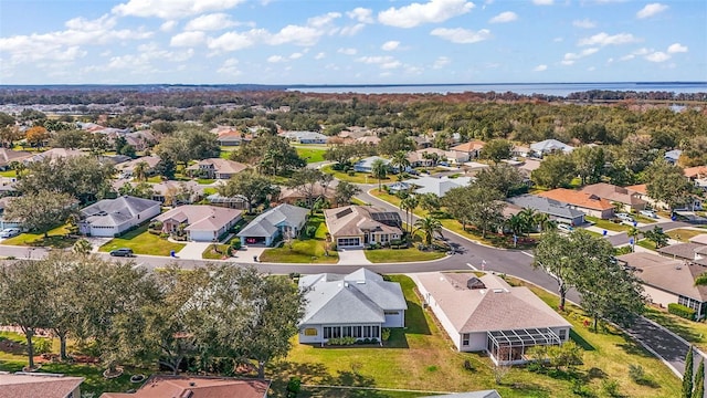 drone / aerial view with a water view