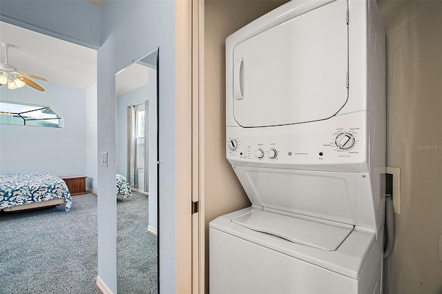 washroom with ceiling fan, stacked washing maching and dryer, and carpet floors