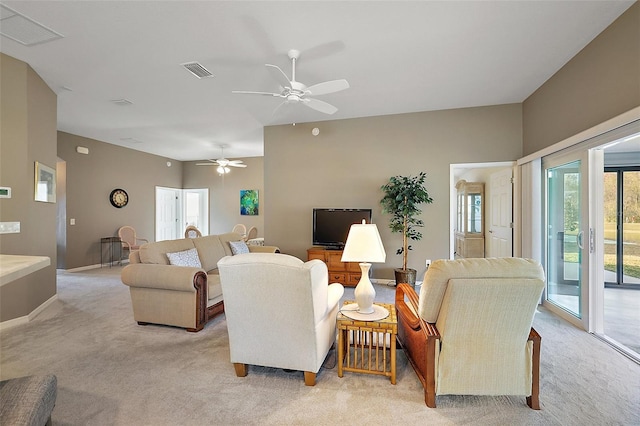 carpeted living room featuring ceiling fan