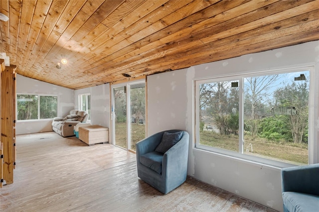 sitting room with wood ceiling, lofted ceiling, and light wood-type flooring