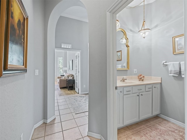 bathroom with tile patterned floors and vanity