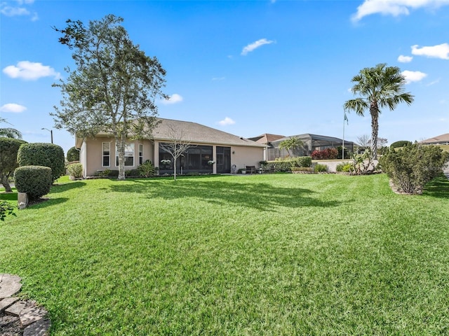 view of yard featuring a lanai