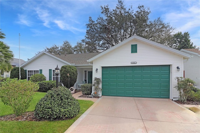 ranch-style home with a garage