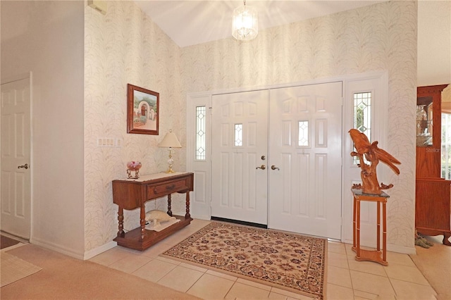 tiled entryway with plenty of natural light