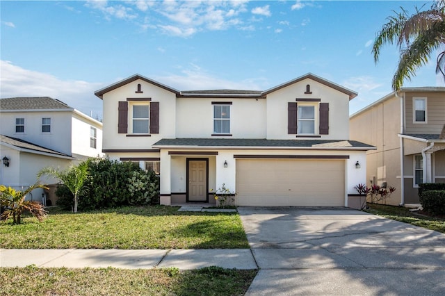 view of front of house featuring a garage and a front yard