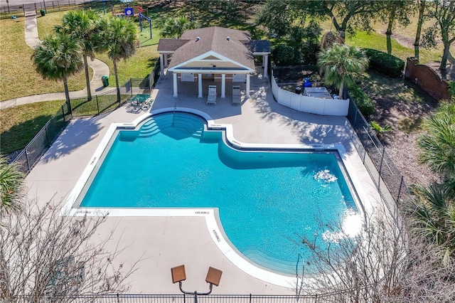 view of pool featuring a patio