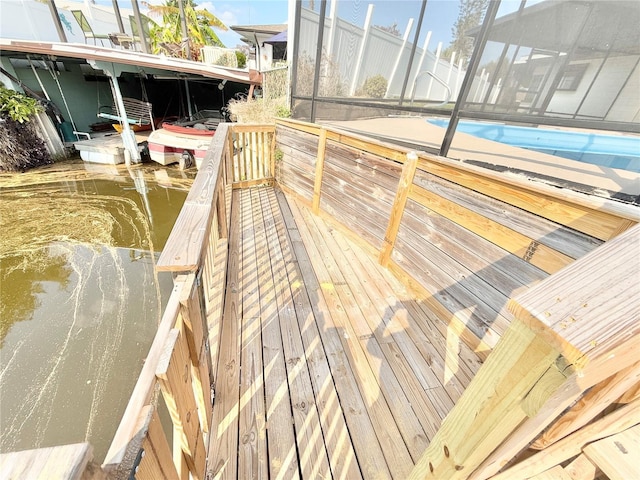 wooden terrace with a dock