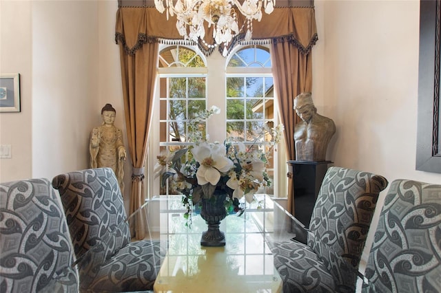 dining area featuring an inviting chandelier