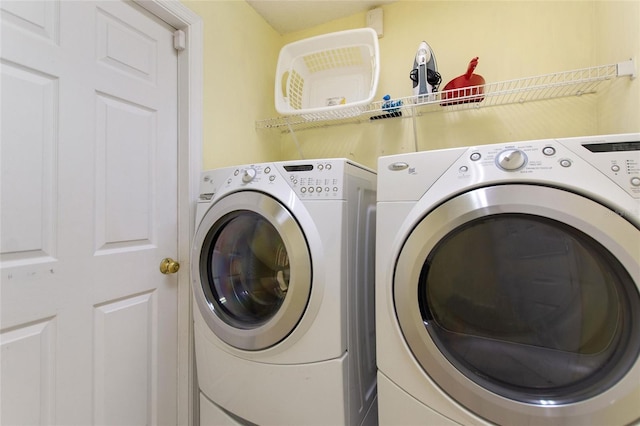 laundry area with washer and clothes dryer