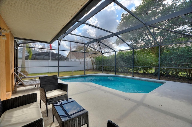 view of pool featuring a lanai and a patio area