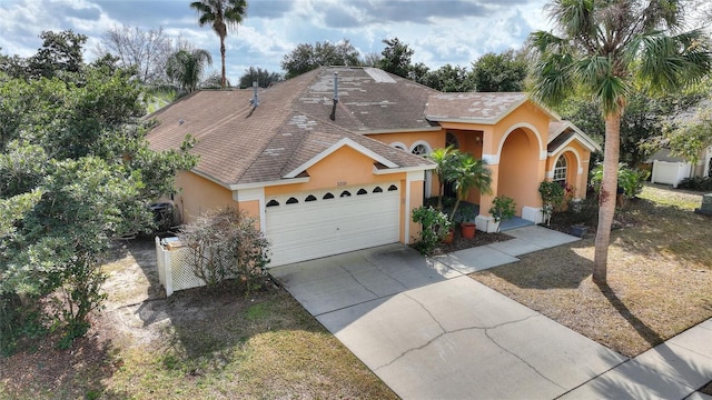 view of front of house with a garage