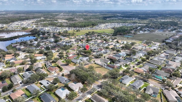 drone / aerial view with a water view