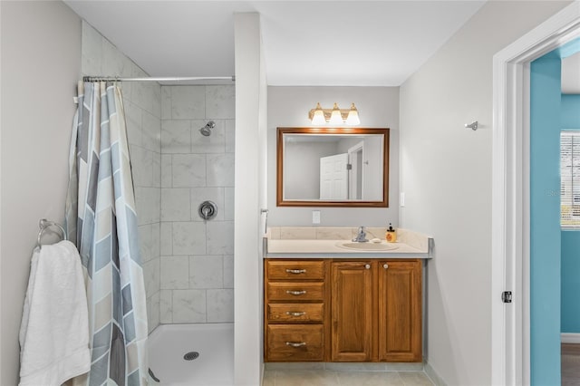 bathroom featuring vanity, tile patterned flooring, and a shower with shower curtain