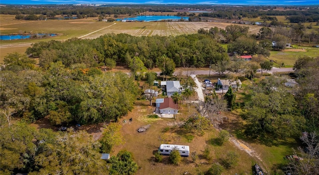 aerial view with a water view and a rural view