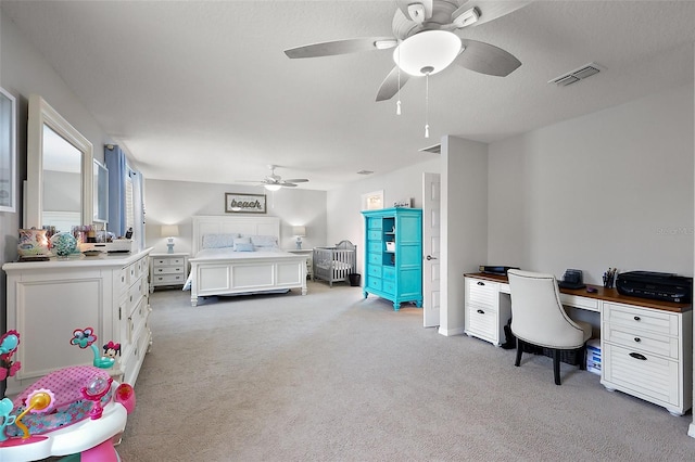 carpeted bedroom with ceiling fan