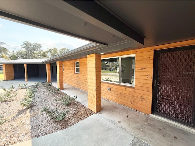 view of patio / terrace with a carport