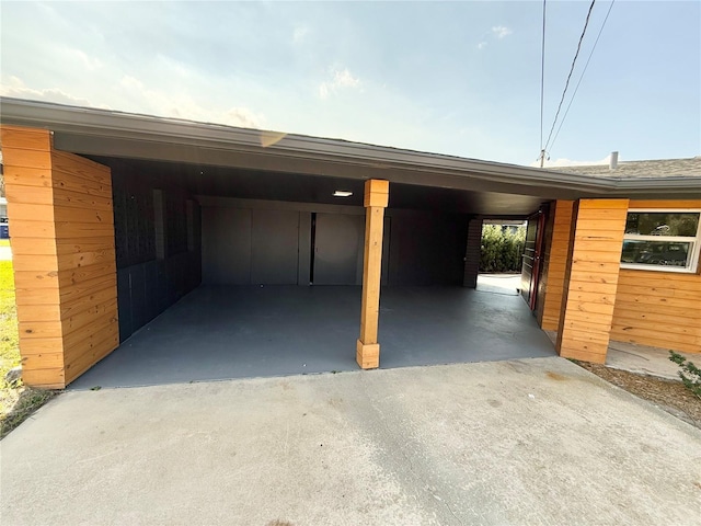 garage with a carport