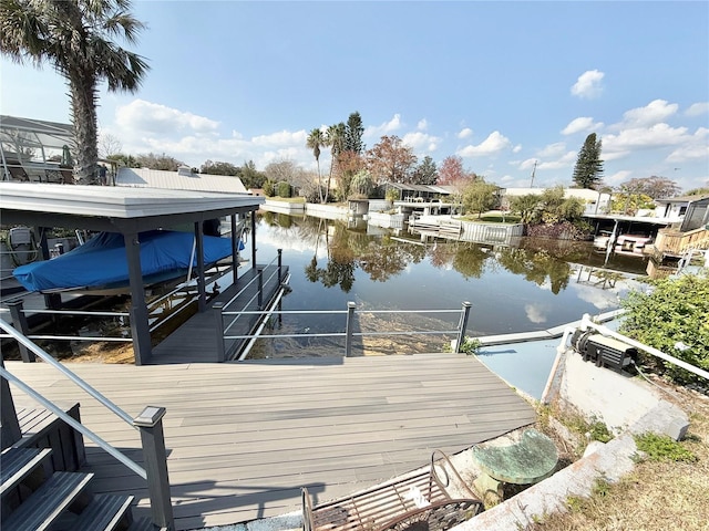 dock area with a water view