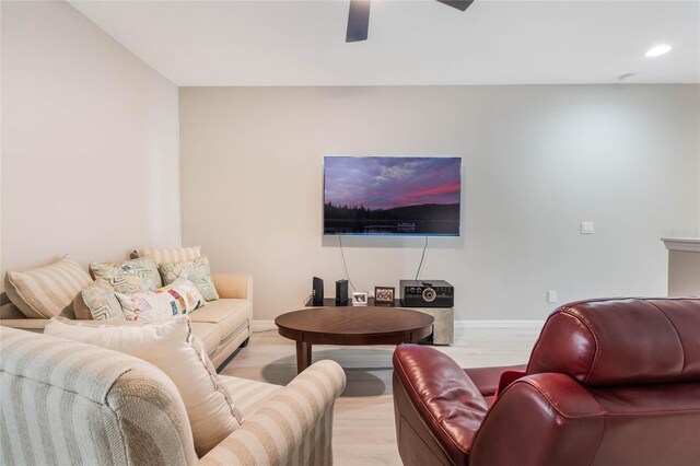 17523 Promenade Dr, Clermont, FL 34711 - living room with ceiling fan and light wood-type flooring