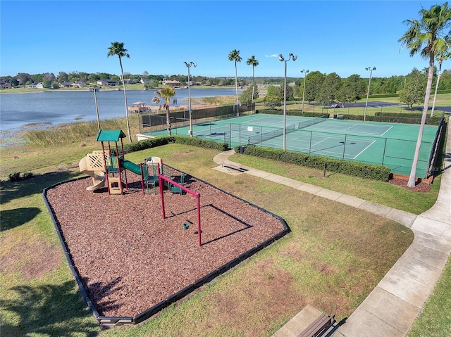 17523 Promenade Dr, Clermont, FL 34711 - view of sport court with a water view, a yard, and a playground