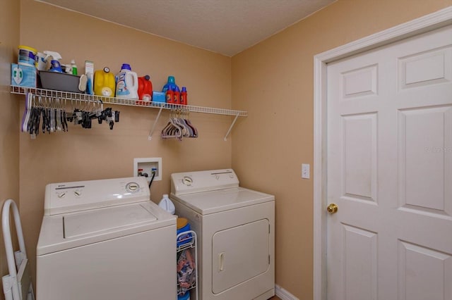 washroom with separate washer and dryer