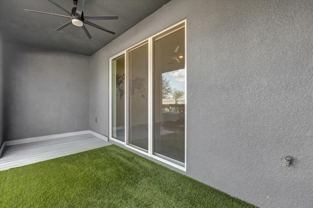 exterior space with a ceiling fan