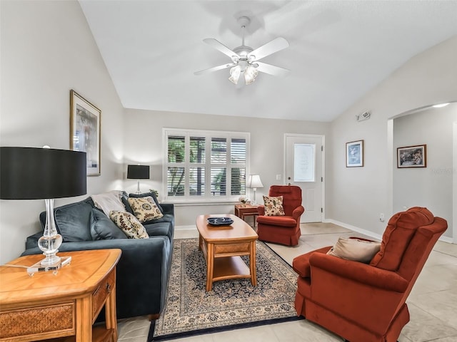 tiled living room with vaulted ceiling and ceiling fan