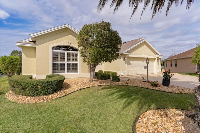 ranch-style home featuring a garage and a front yard