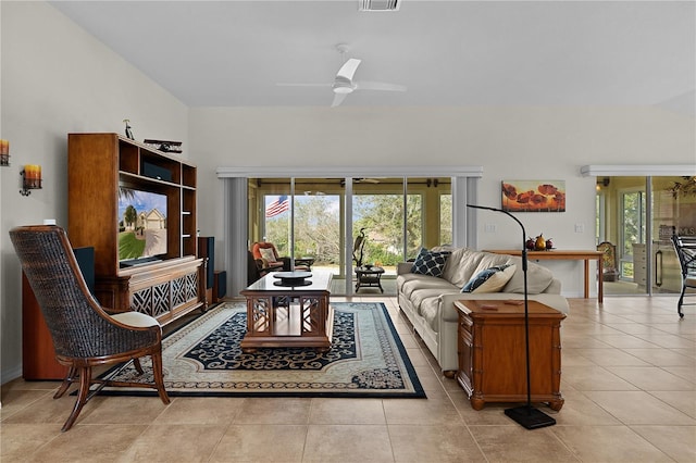 living room with light tile patterned flooring and ceiling fan