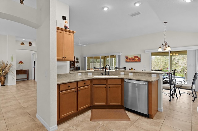 kitchen featuring light stone counters, dishwasher, sink, and kitchen peninsula