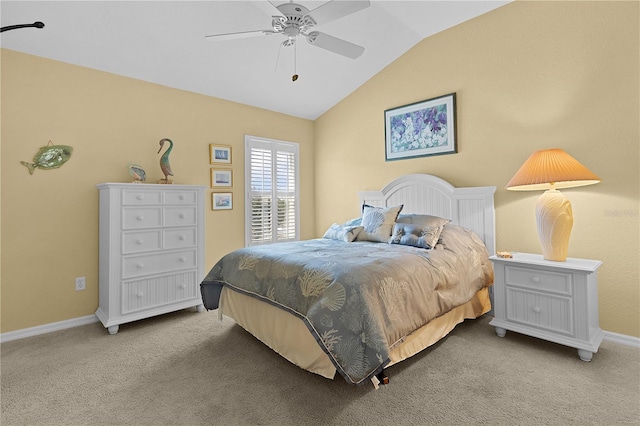 carpeted bedroom featuring ceiling fan and lofted ceiling