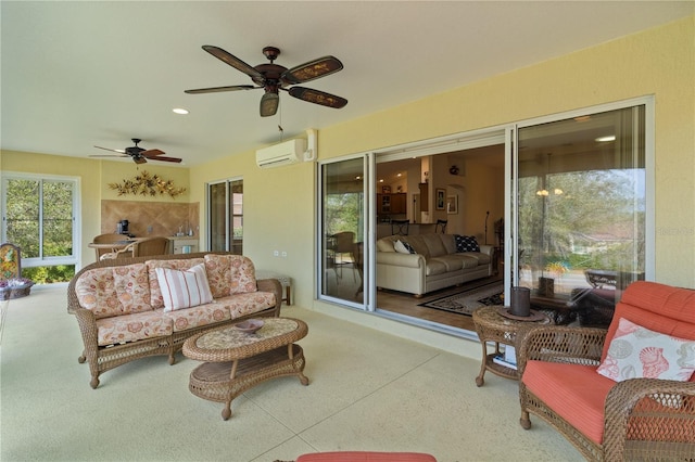 exterior space featuring a wall mounted air conditioner and ceiling fan