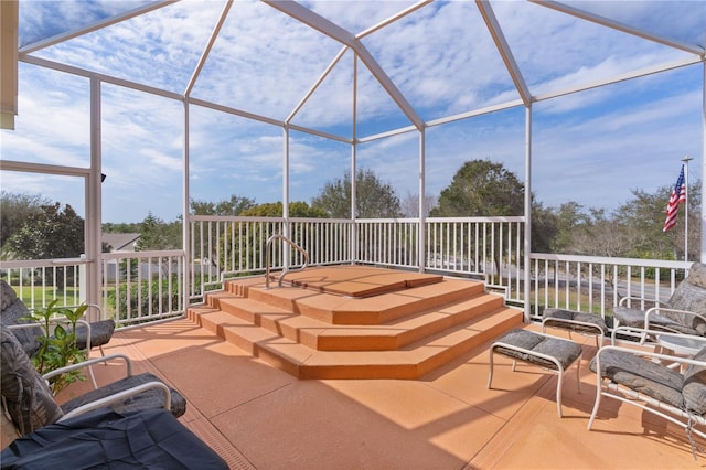 view of patio with a lanai