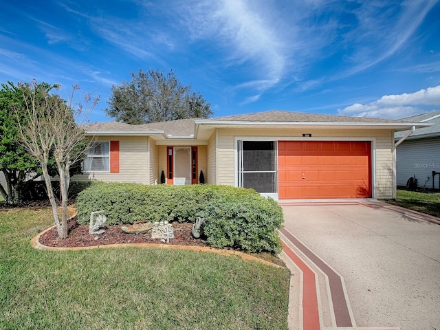 single story home with a garage and a front yard