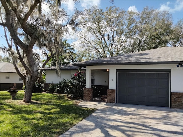 ranch-style house with a garage and a front lawn