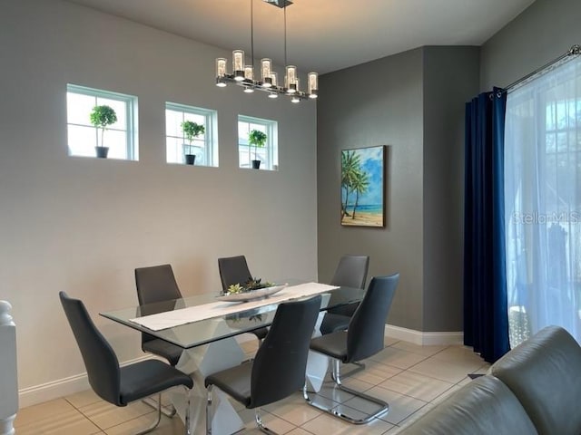 294 Captiva Dr, Davenport, FL 33896 - dining area featuring light tile patterned flooring and baseboards