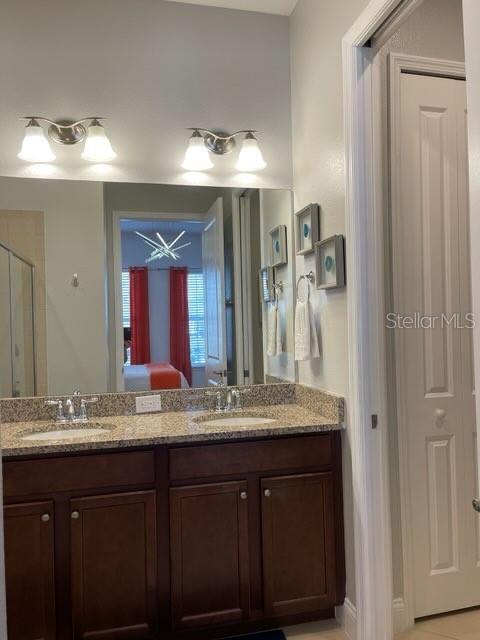 294 Captiva Dr, Davenport, FL 33896 - full bath featuring double vanity