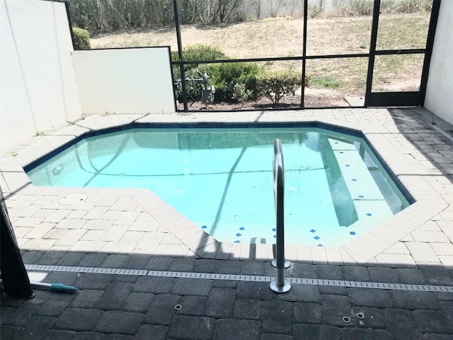 294 Captiva Dr, Davenport, FL 33896 - outdoor pool with glass enclosure and a patio area