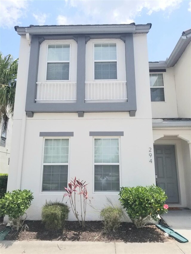 294 Captiva Dr, Davenport, FL 33896 - view of property exterior featuring stucco siding