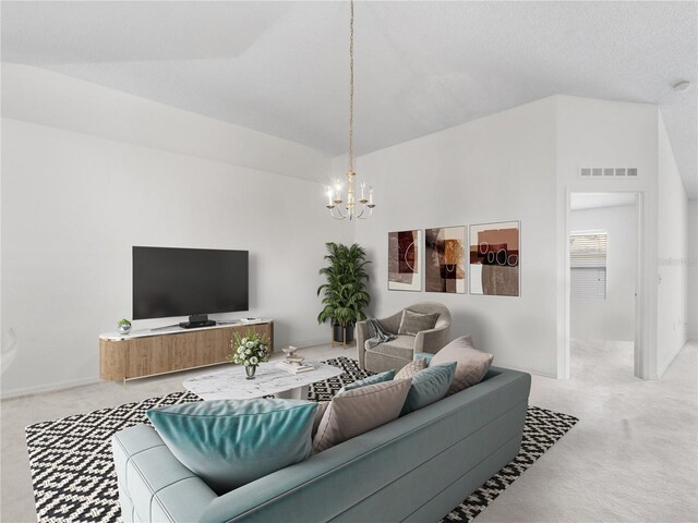 living room featuring lofted ceiling, an inviting chandelier, light carpet, and visible vents