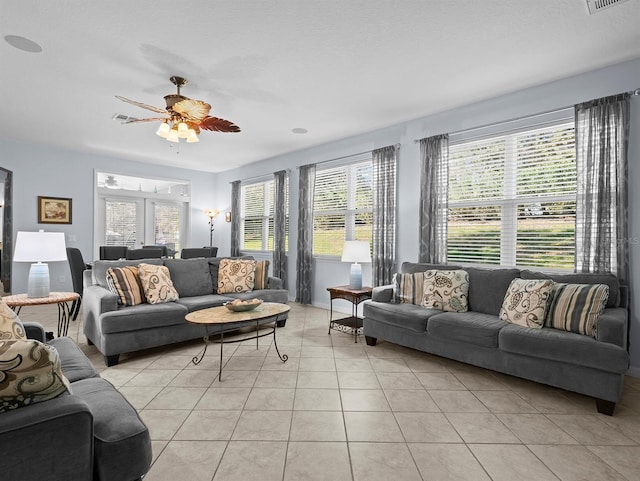 887 Daisy Hill Ct, Apopka, FL 32712 - living room featuring light tile patterned flooring and ceiling fan