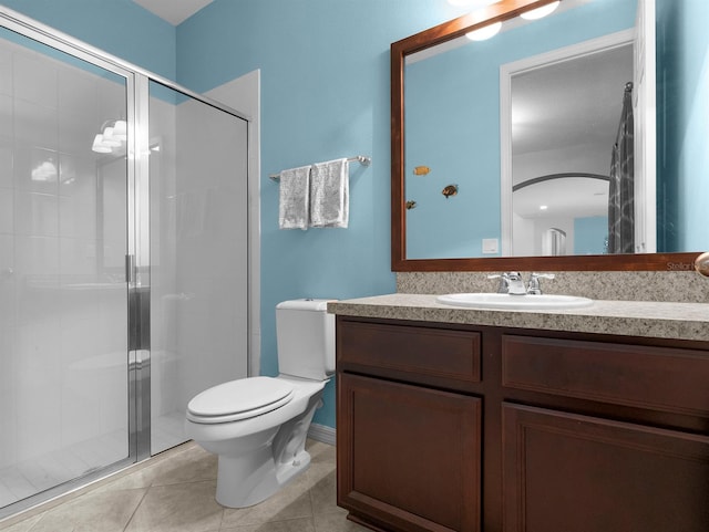 887 Daisy Hill Ct, Apopka, FL 32712 - bathroom featuring tile patterned flooring, vanity, an enclosed shower, and toilet