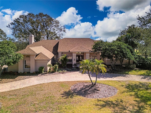 view of front of property with a front yard