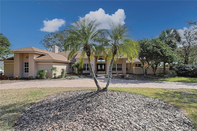 view of front of home with a front lawn