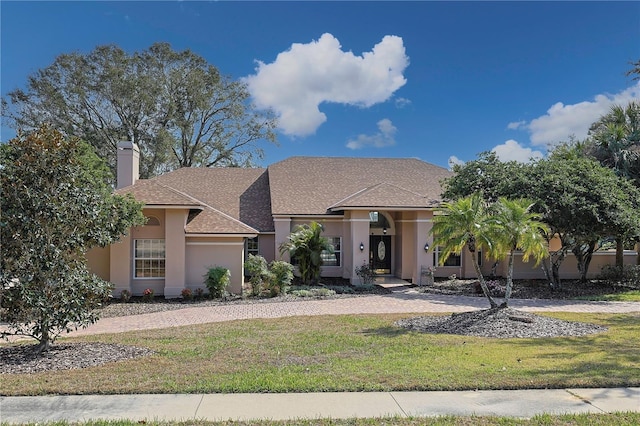 view of front of house featuring a front yard