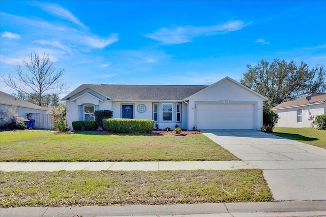 ranch-style home featuring a garage and a front lawn