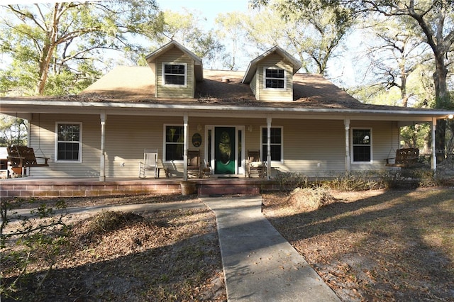 view of front of home featuring covered porch