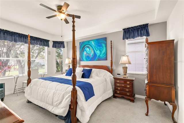 bedroom featuring carpet flooring, a ceiling fan, and baseboards