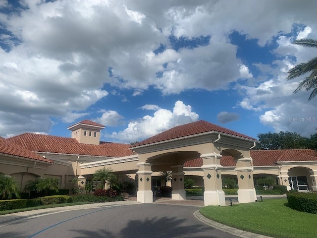 view of building exterior with driveway