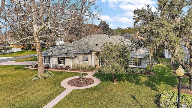 view of front of property with a front lawn